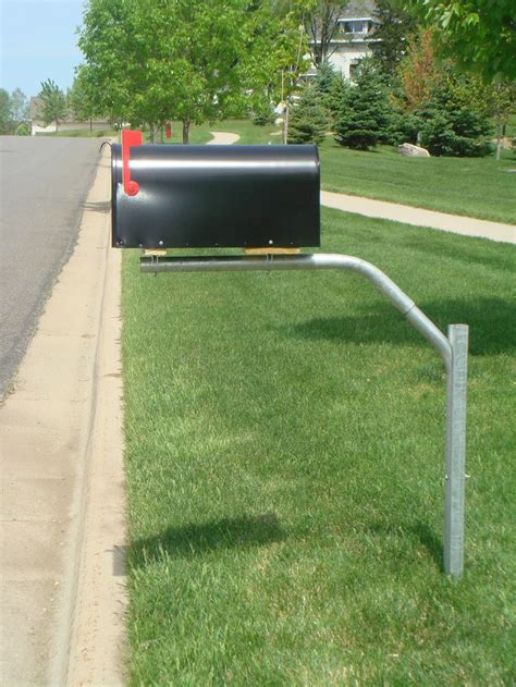 metal pipe inside mail box metal pipe to susport|cement post for mailbox.